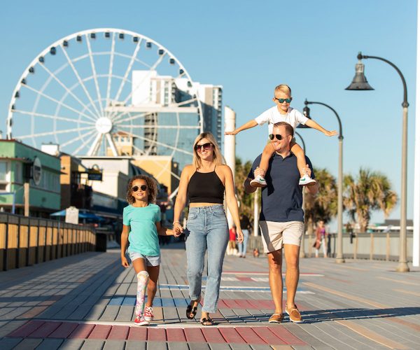 family_boardwalk_beach-img